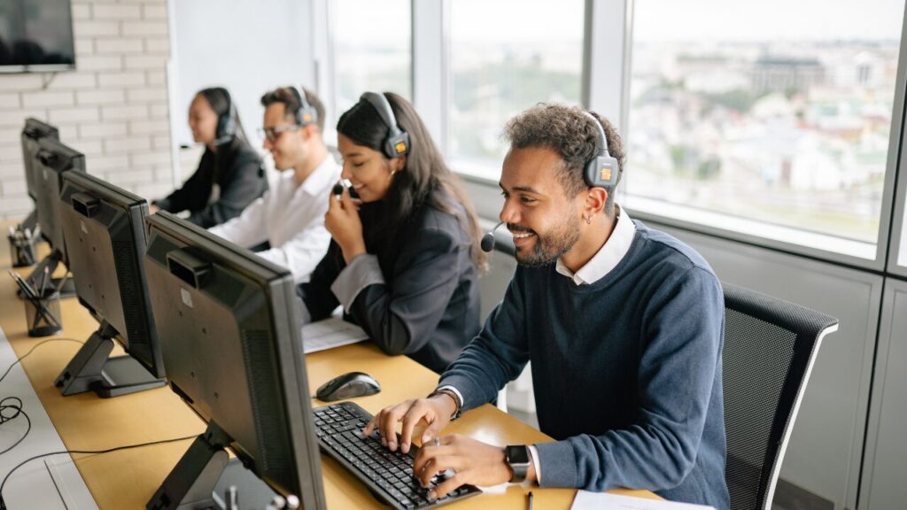 Call centre agents working at desks